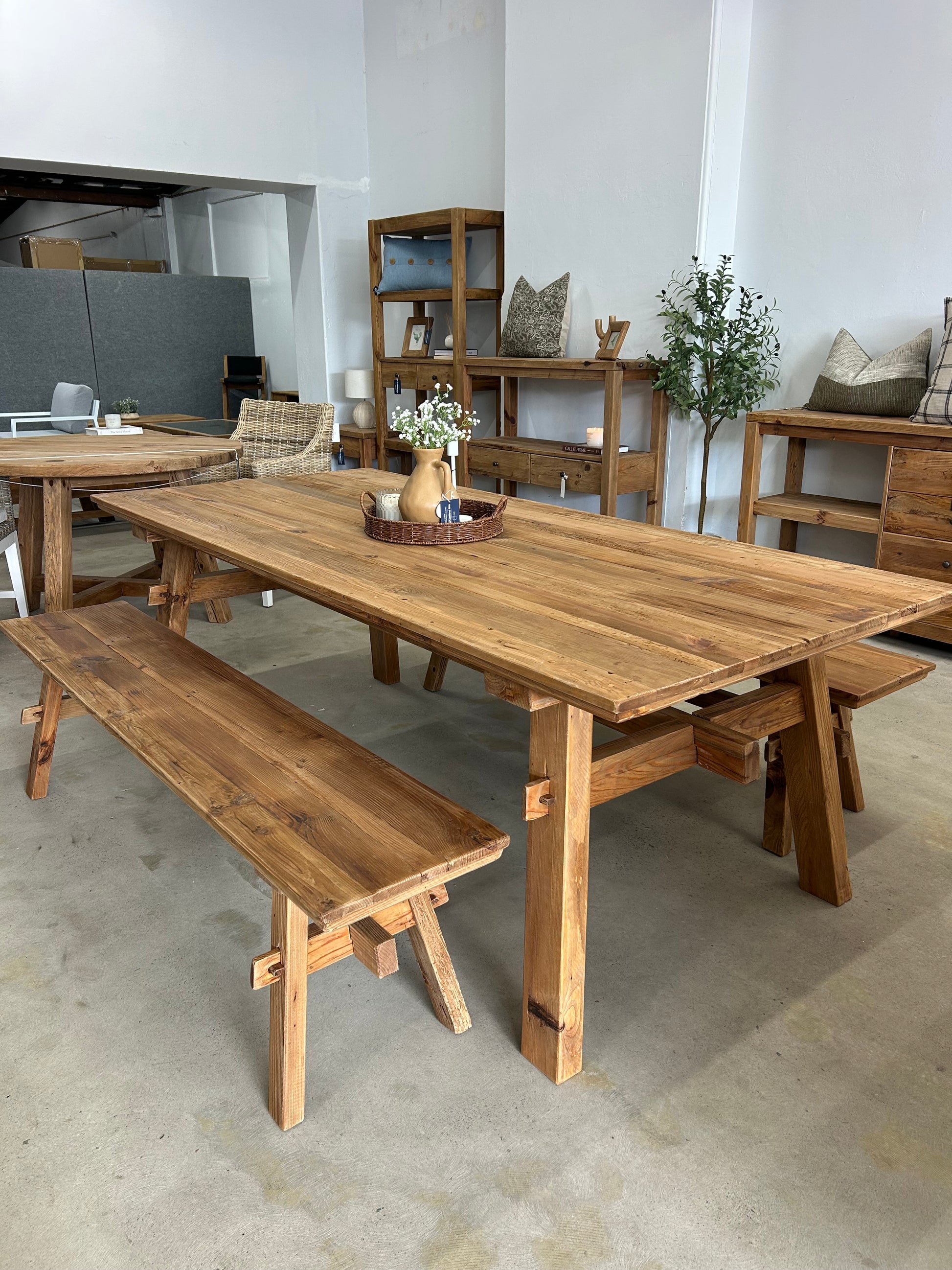 Rustic wooden dining setting with benches