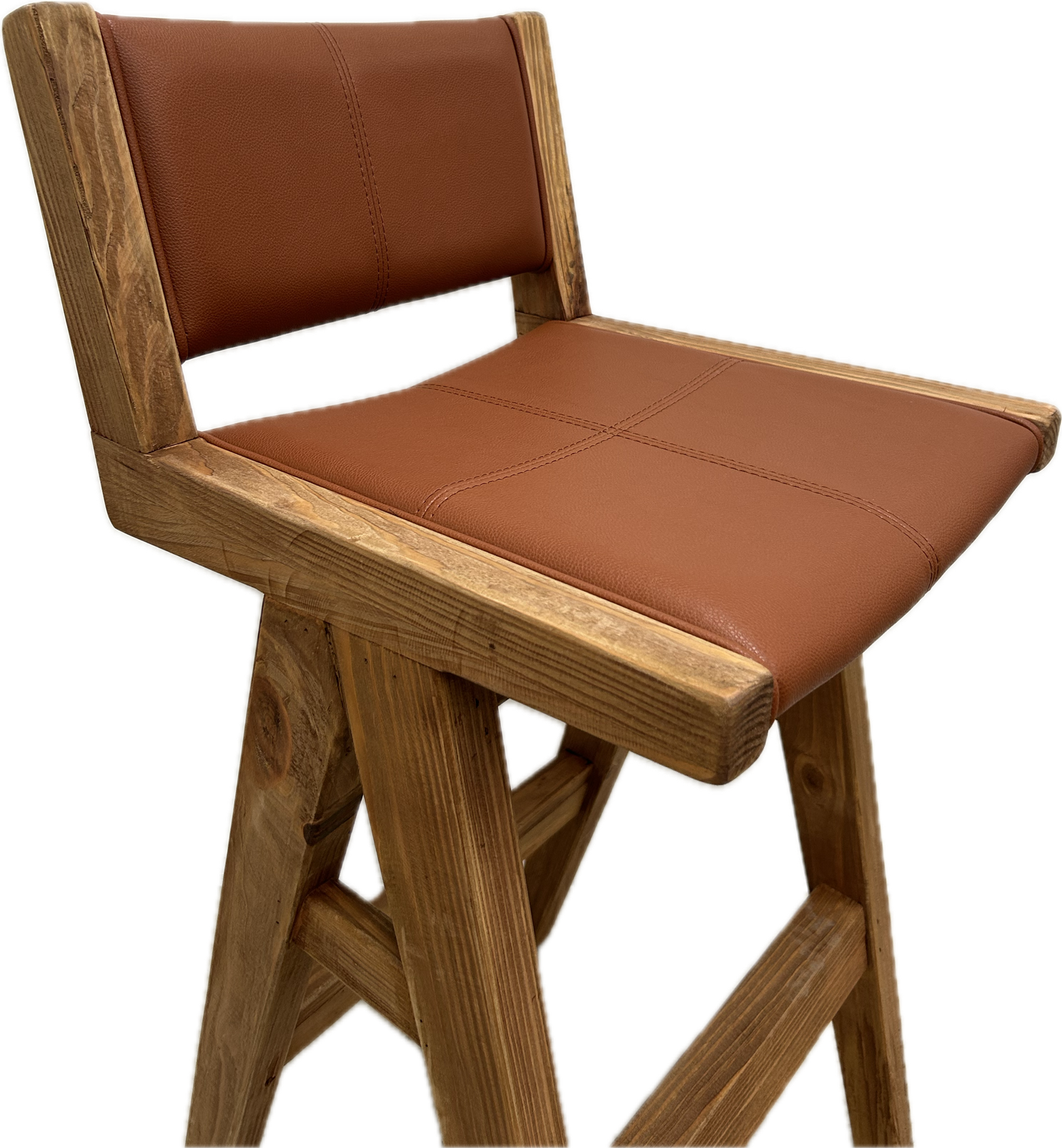 Close up of a tan pu leather seat of a kitchen stool or bar stool