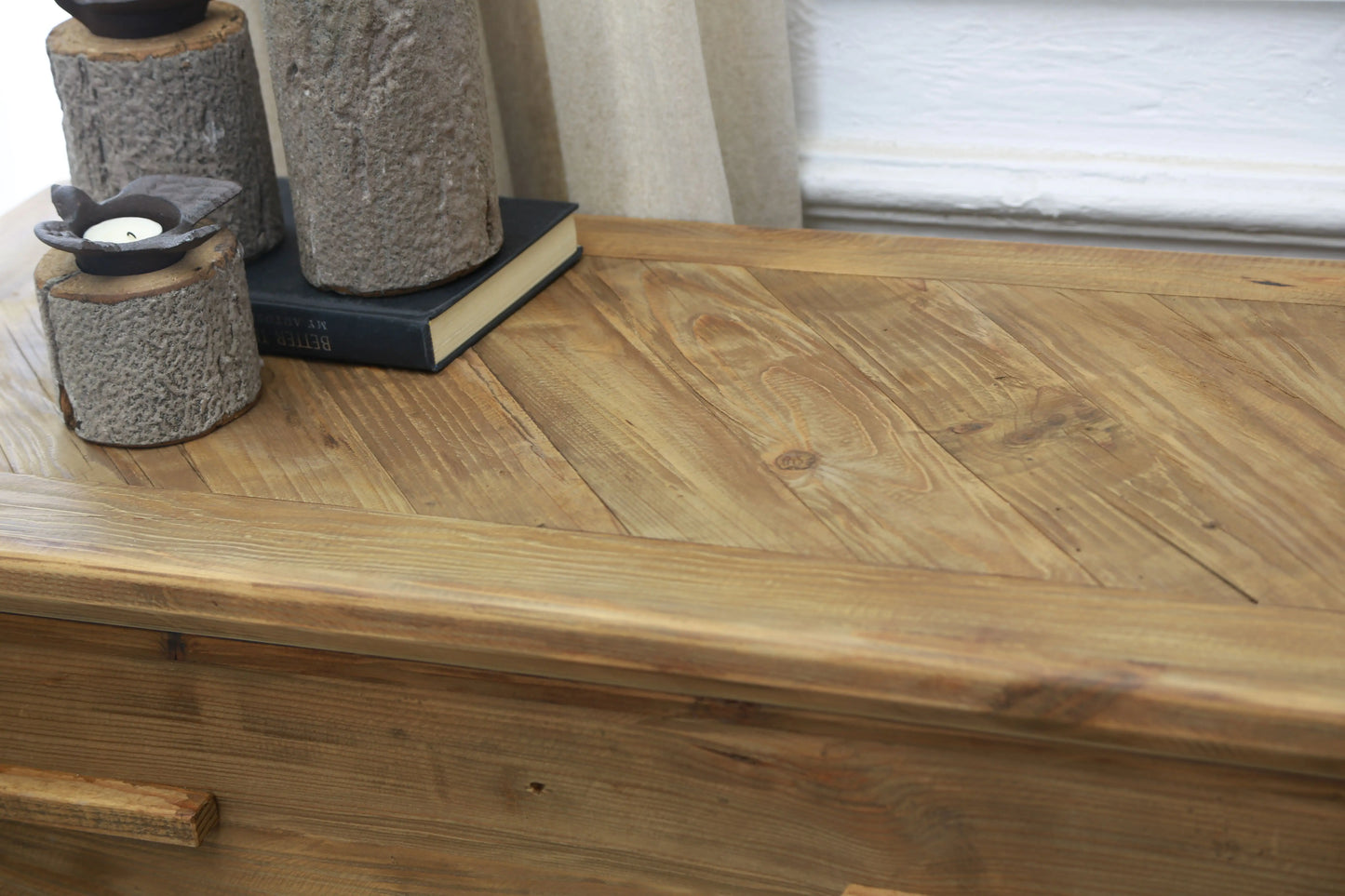 Close up of angled wood pattern on top of the reclaimed wood henley storage buffet