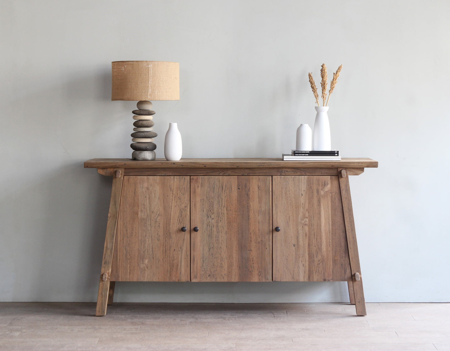 Small farmhouse style storage buffet made of dark teak wood