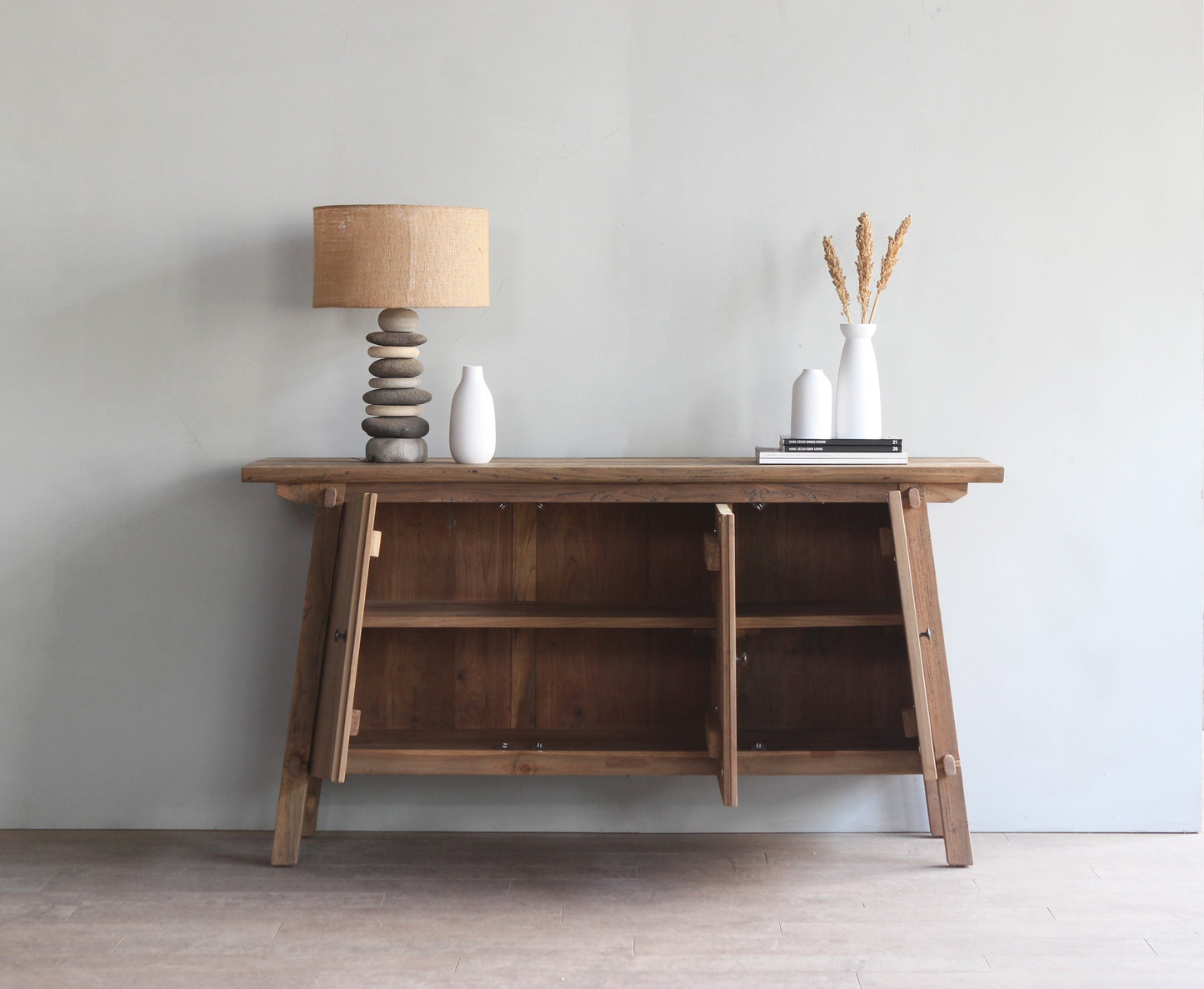 Shelving inside a wooden storage buffet farmhouse style