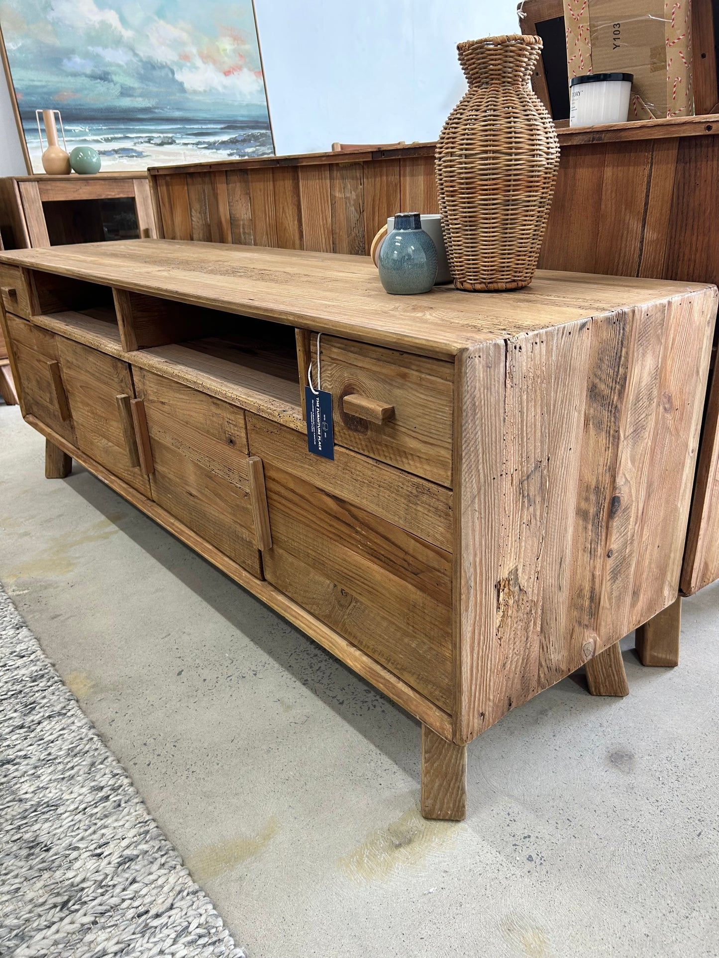 Close up of reclaimed wood details of a farmhouse style TV Unit with natural wood finish