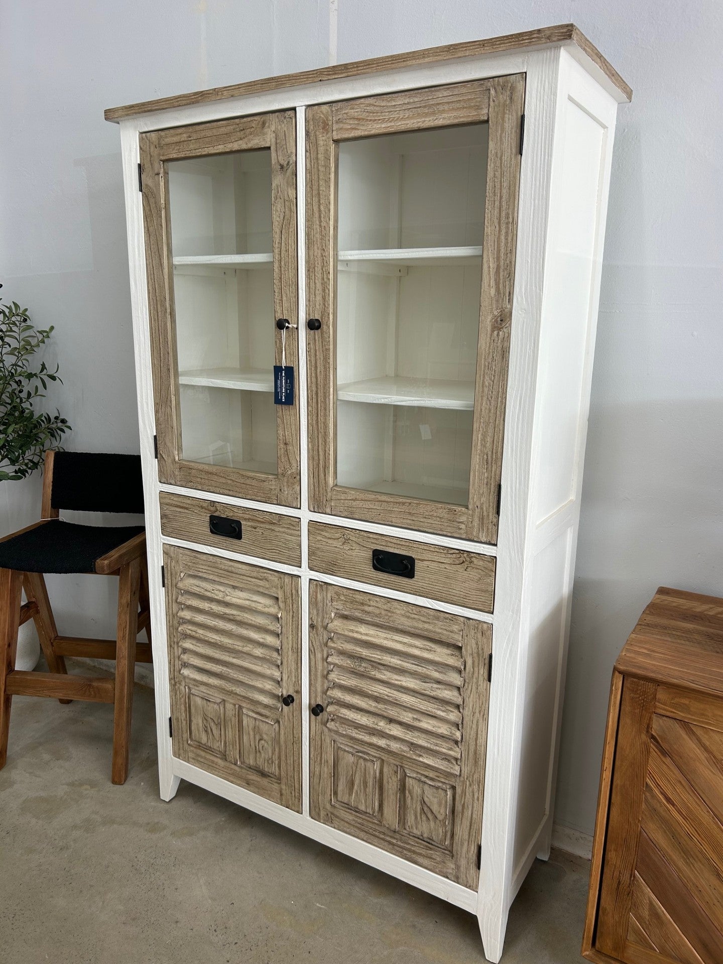 Coastal style tall display cabinet